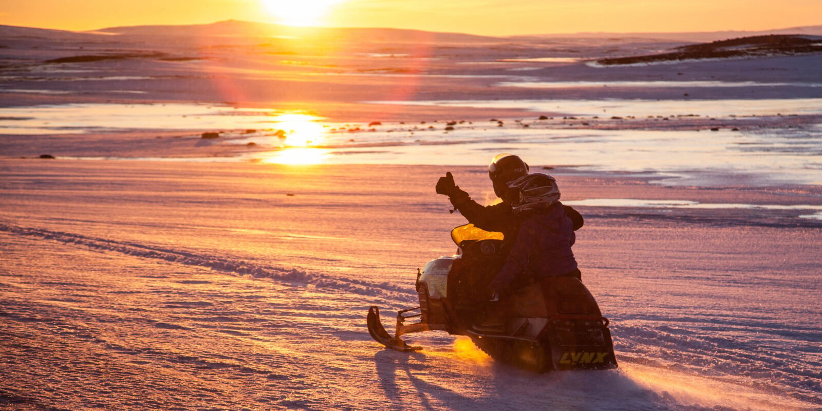 Snowmobiling in Midgard, Iceland