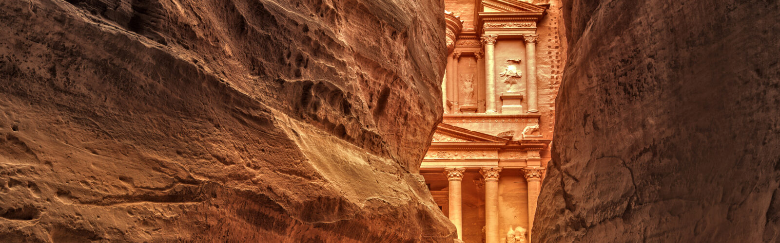 View of Sig in Petra, Jordan, from between the two red rock faces at the entrance