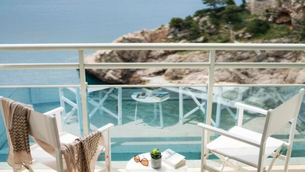 Balcony view with two chairs overlooking the ocean in Croatia Hotel Bellevue Dubrovnik